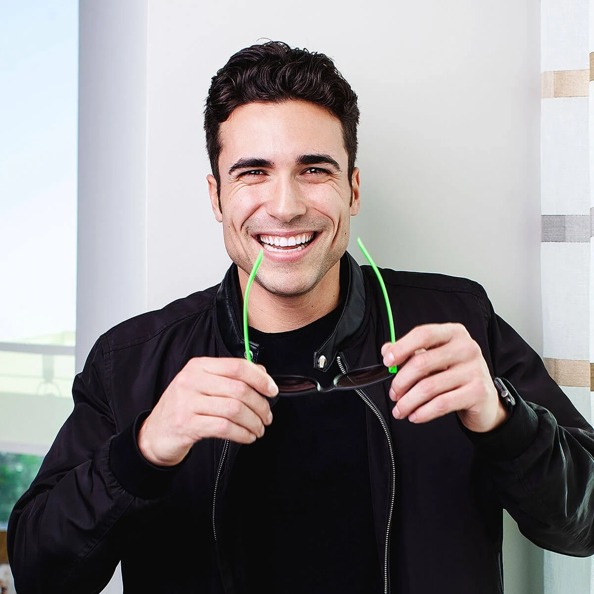 MINT dentistry campaign portrait — model with signature green accessories